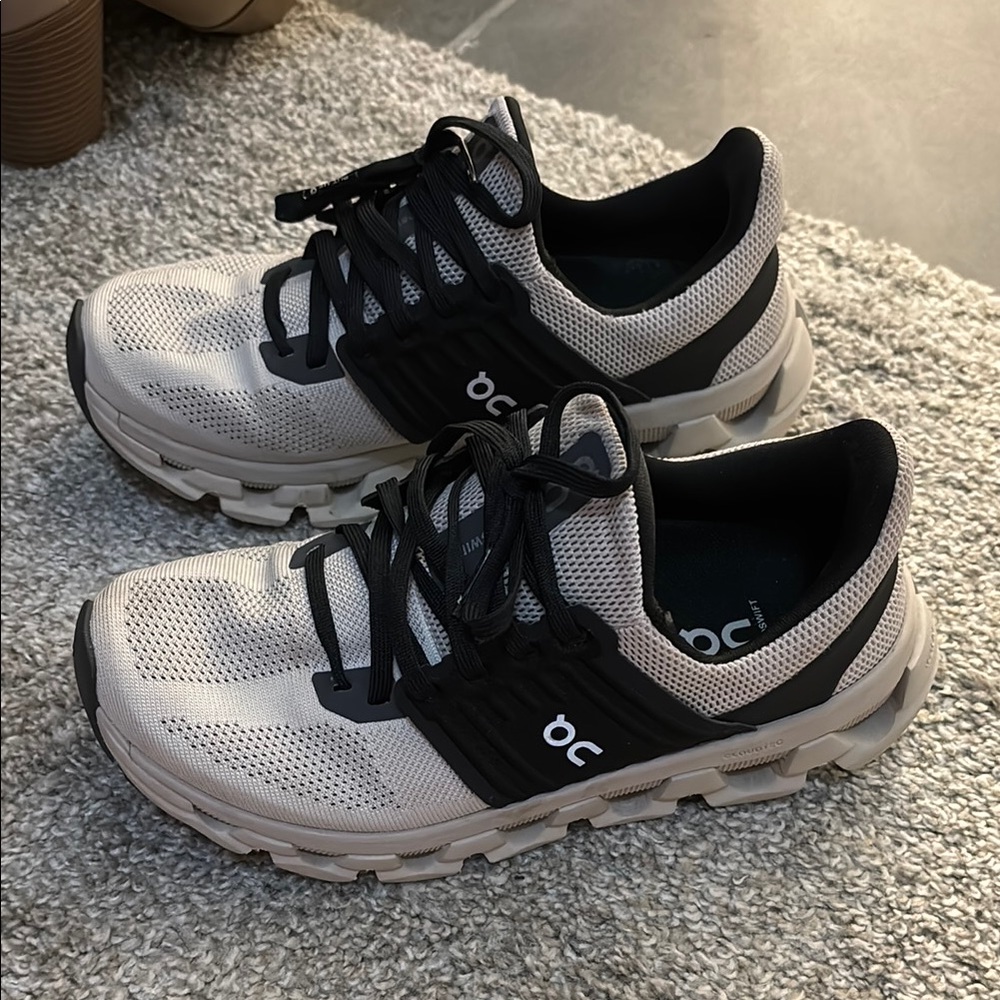 On Running Black and Cream Sneakers